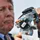 Executive Director of the Center for Automotive Safety, Clarence Ditlow, shows GM’s faulty ignition switch. Image: J. Scott Applewhite/AP